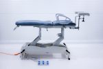 Akron Streamline Gynae 3 Deluxe Fotel Ginekologiczny ze Sterownikiem Nożnym Mobilny